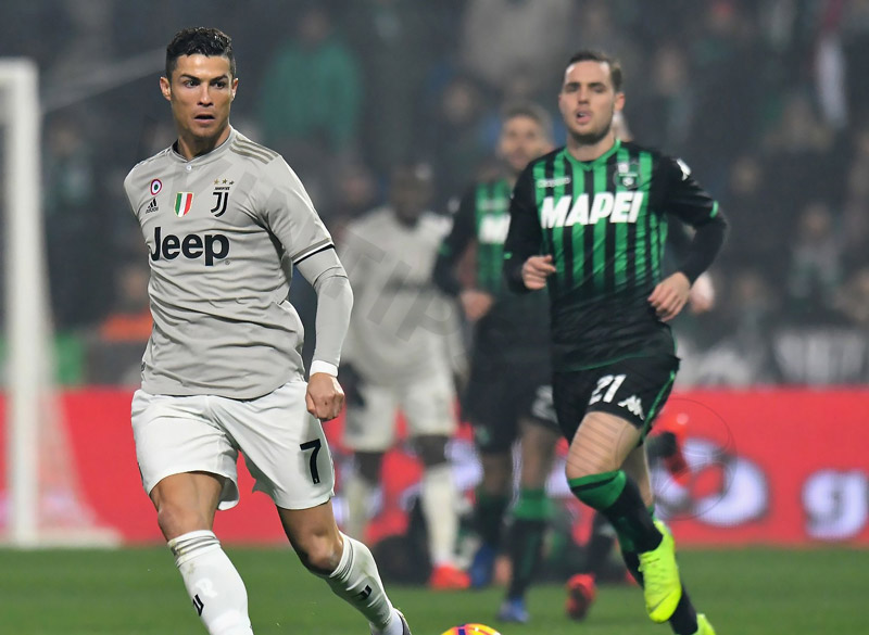 Juventus' Ronaldo surpasses Sassuolo goalkeeper Andrea Consigli in Serie A match